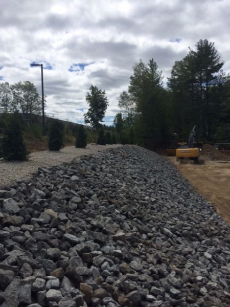 Completed rip rap and gravel Completed rip rap and gravel